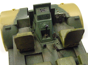 [From the Eduard set are the textured floor, gun racks, instrument panel, and front window details.]