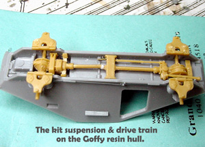 [The kit suspension & drive train on the Goffy resin hull.]