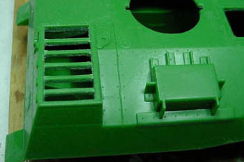 [The molded in radiator grill was removed with a sharp #11 blade leaving the support bars.]