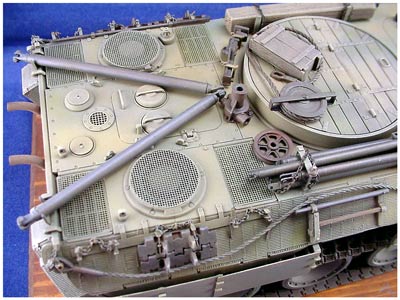 [Completion of the rear deck area includes adding mounting points for the deck crane, two supports and a lock down part for the 2 towing bars, and the bars mounted tin the stowed position.]