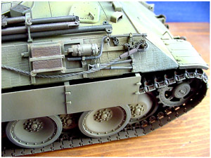 [The side mounted stowage and spare track brackets are a combination of kit supplied PE items and modified kit or scratch built items.]