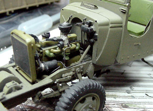 [I added the fuel line from the tank to carb, battery wires, and break lines.]