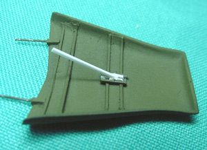 [I scratched the under side of the hood, and the prop rod assembly.]