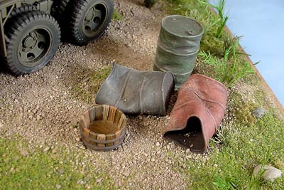 [I used Armand Bayardi's damaged and regular drums, and a small wooden tub. ]