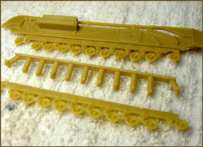[The way the kit goes together with all those little road wheels sandwiched in the sponsons is clever. ]