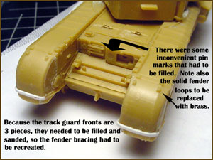 [The molded fender loops would be replaced.]