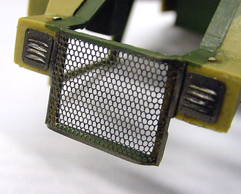 [The kit radiator screens were cut away and replaced with etched brass pieces.]