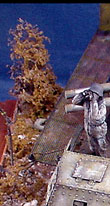 The diorama base was built in tiers using foam board and Styrofoam.
