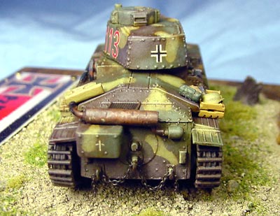 [The muffler was drilled out and dented up, and a fine chain was draped across the rear tow hooks.]