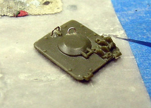 [I sliced off the plastic lump hatch handles on these hatches, and replace them with fine wire. ]
