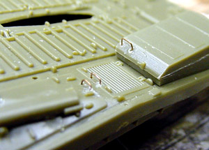 [I sliced off most of the plastic lump handles on the hull, and replace them with fine wire.]