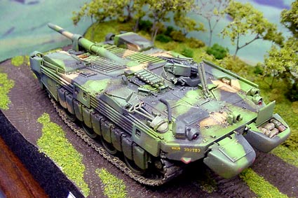 [The kit is all styrene with no etch or anything else fancy, and the tracks are the rubber band type. ]