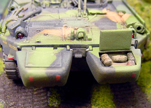 [A view of the hatch on one of the rear storage boxes that I cut open and filled with some bags, rolls, and other equipment. Note the MV lenses.]