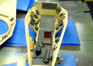 [The full interior had to be painted and finished before the hull top and bottom pieces were cemented together.]