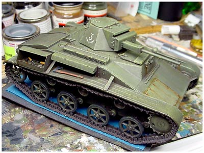 [Everything was primed with Model Master burnt umber enamel, followed with a 90% coat of MM dark green enamel.]