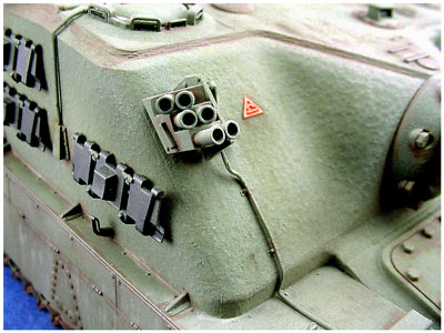 [The tank was weathered to represent the lone A39 sent to Germany for field-testing.  The red triangle indicated the tank was cast from mild steel. ]